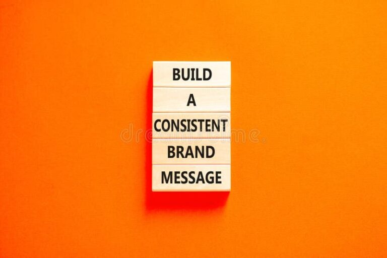 Wooden blocks spelling “Build a Consistent Brand Message,” symbolizing the foundational role of strong, clear messaging in guiding brand storytelling and audience engagement.